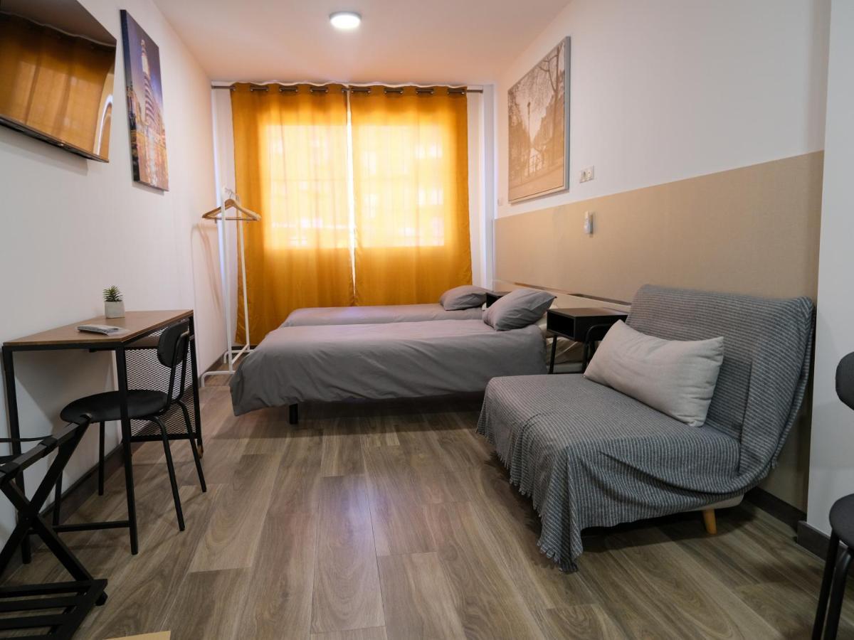 Estudio con sofá cama
