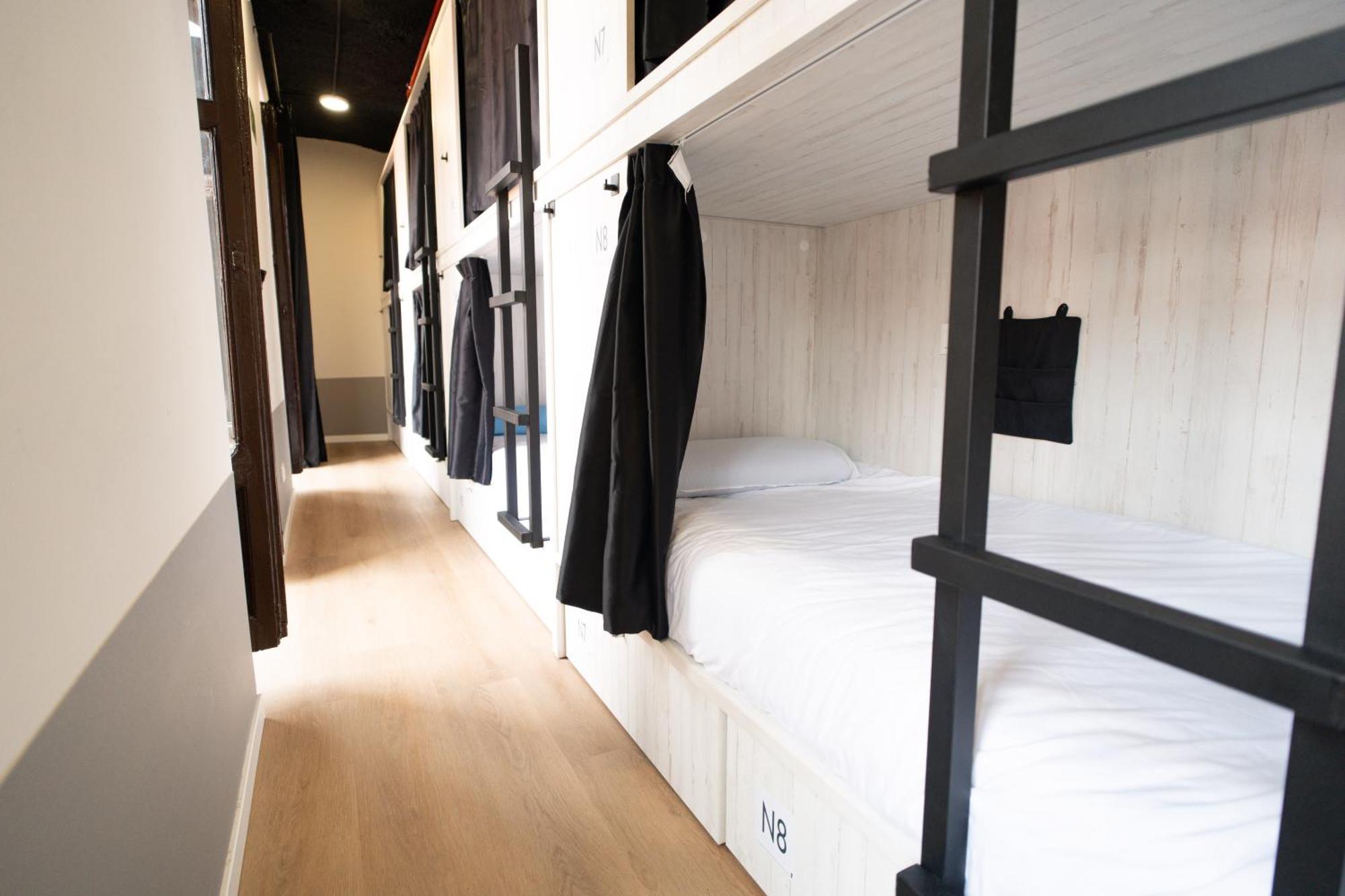 Cama en habitación compartida mixta de 8 camas