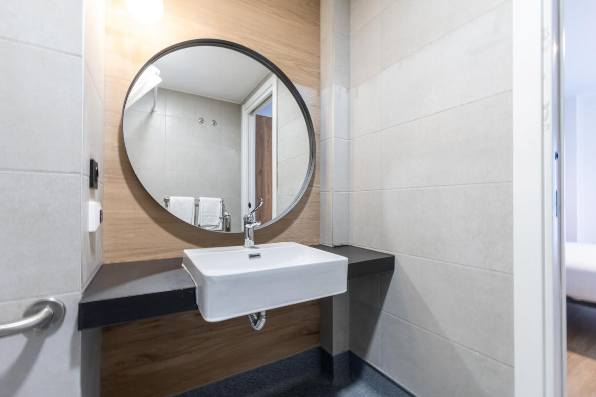 One-bedroom apartment a partially accessible bathroom